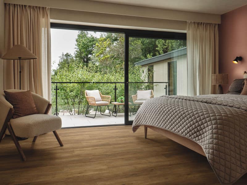 Rigid vinyl floor planks by Karndean in a room setting